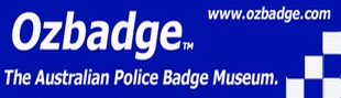 newlogoozbadge1y.jpg